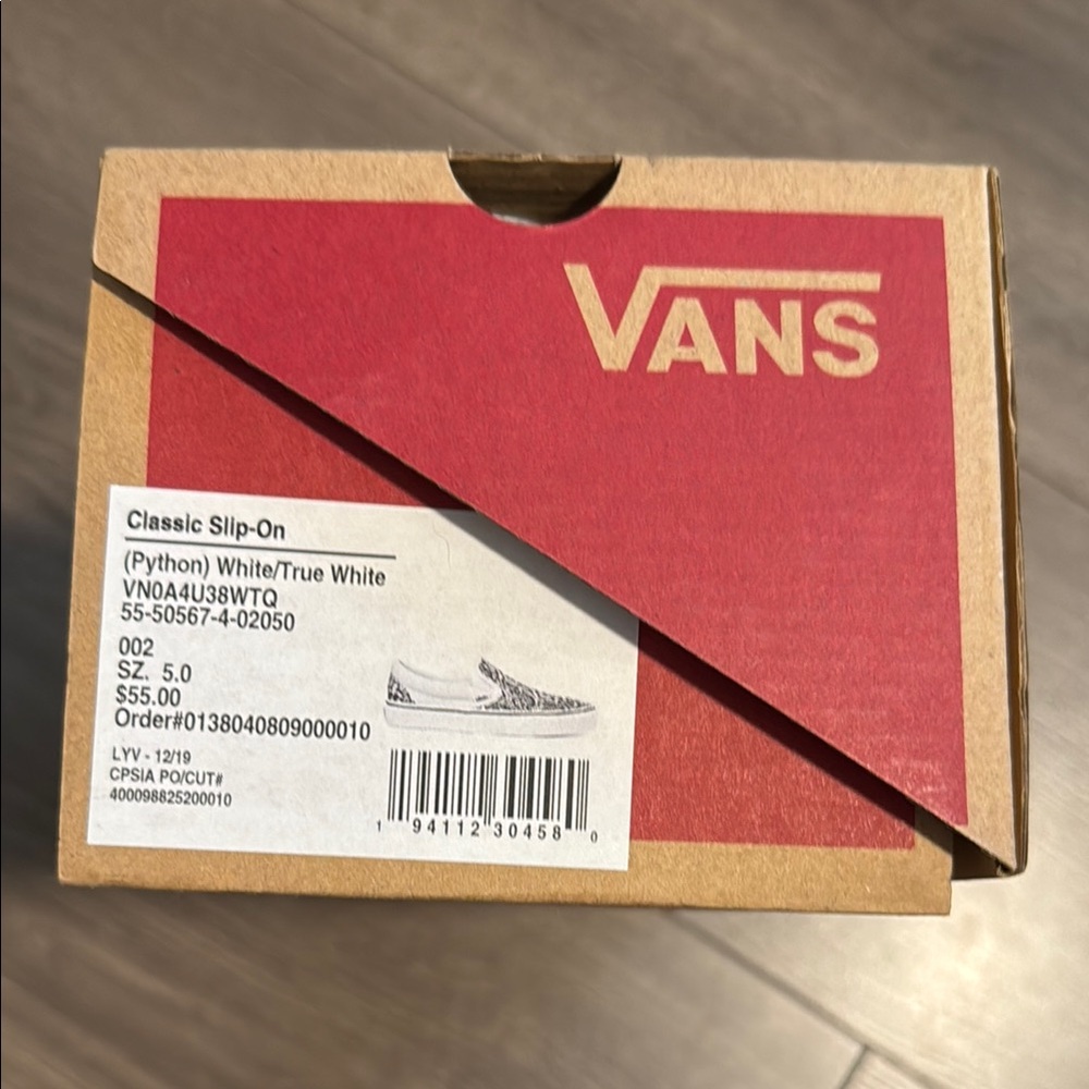 Vans Black and White Slip-On Sneakers - Picture 8 of 9